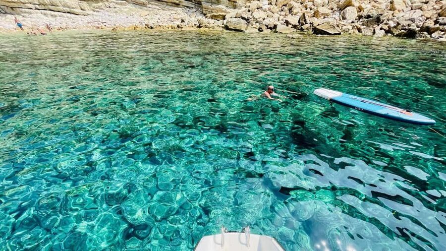 Porto Conte: Half-day catamaran tour with aperitif - What the boat is like for three hours