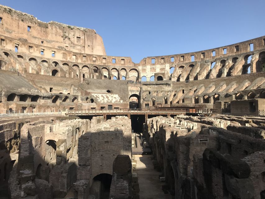 Rome: Arena of Colosseum, Roman Forum and Palatine Hill - Walking through the Roman Forum