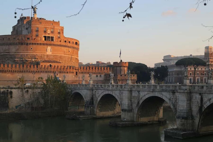 Rome: Castel Sant'Angelo Skip-the-Line Ticket - Meeting the orange umbrella near the bridge