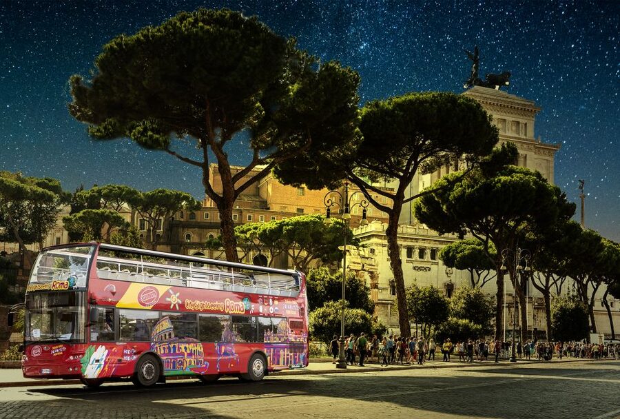 Rome: City Highlights Open-Top Bus Night Tour - The Colosseum is the night’s main picture