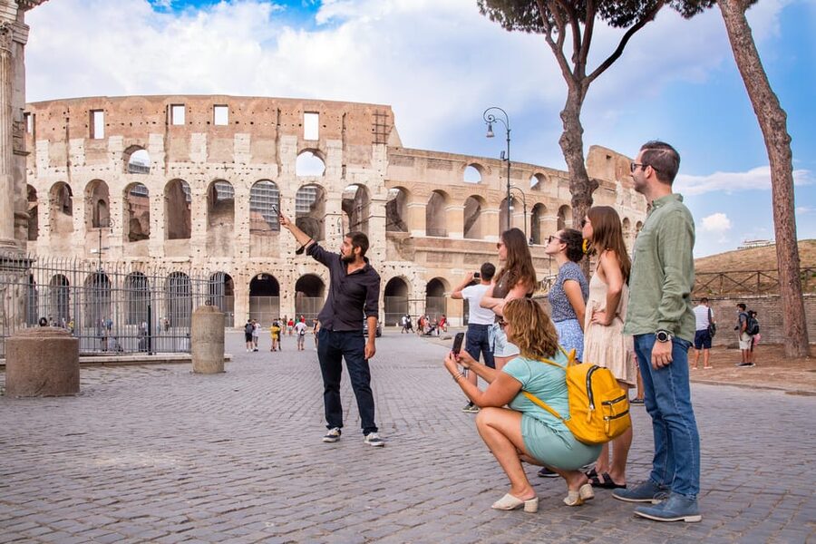 Rome: Colosseum Arena Access and Ancient Rome Guided Tour - Walking through the Roman Forum