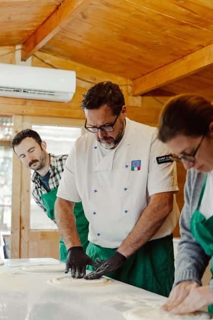 Rome: Combo Pizza and Pasta Cooking Class with Wine - Making pizza from dough to wood-fired oven