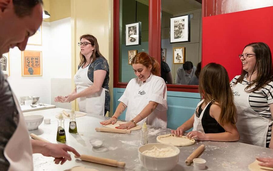 Rome: Pizza & Tiramisu Making Class with Wine & Limoncello - Kneading and stretching your Roman pizza