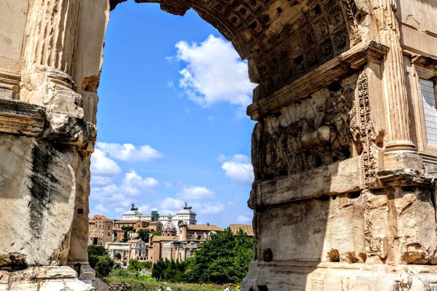 Rome: Small-Group Colosseum, Roman Forum & Palatine Hill - Walking through the Roman Forum