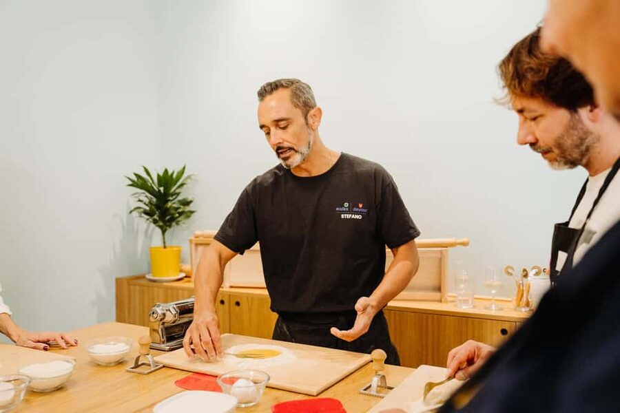 Rome: Traditional Pasta Making Class with Wine & Gelato - Sitting down to eat your own pasta