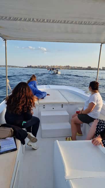 Siracusa: Ortigia & Sea Caves Speedboat Tour with Swim Stop - Meeting the boat beside Ortigia’s waterfront