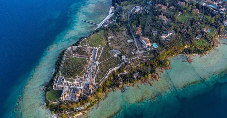 Sirmione: 25 Minute Boat Cruise around the Peninsula - Leaving the harbor beside Scaligero Castle