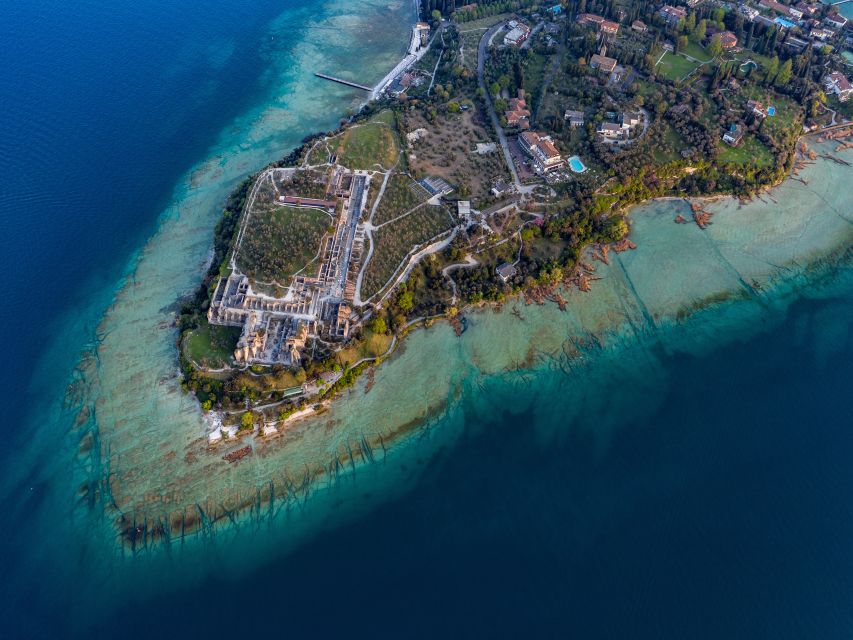 Sirmione: 25 Minute Boat Cruise around the Peninsula - A captain-led ride with a light touch
