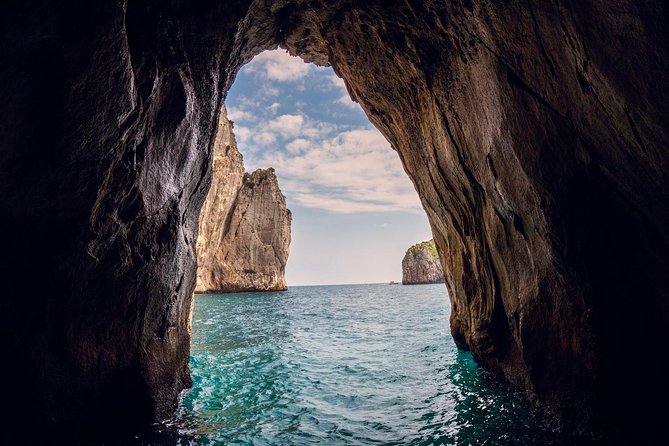 Small Group Capri Island Boat Ride with Swimming and Limoncello - White Grotto and the first stretch of coast