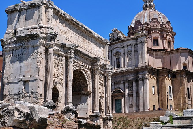 Small Group Colosseum, Roman Forum & Palatine Hill Tour - Entering the Colosseum for the one-hour highlight