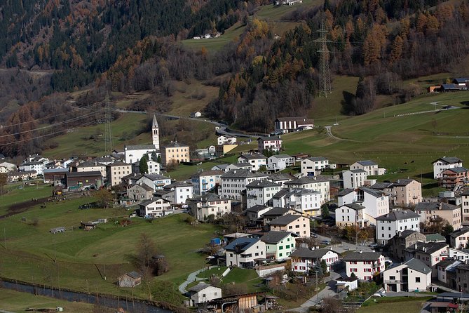 Swiss Alps Bernina Red Train and St.Moritz Tour from Milan - Brusio Viaduct and the run into Tirano