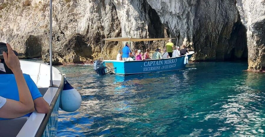 Syracuse: Boat Tour with Captain Mirko, Snorkeling & Caves - Passing under Umbertino Bridge