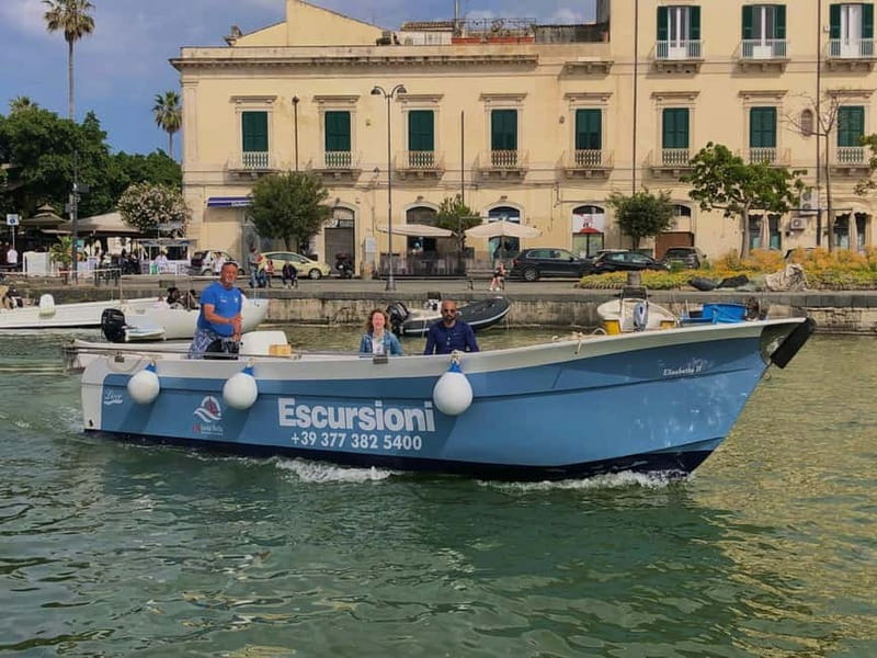 Syracuse: Ortigia Island and Sea Caves Boat Tour with Drinks - Seeing Ortigia from the Alfeo waterfront