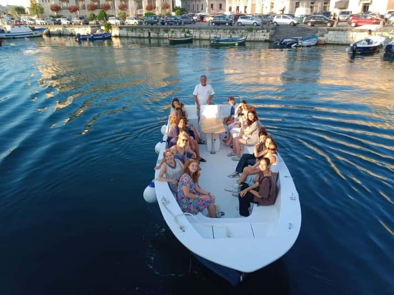 Syracuse: Ortigia Island and Sea Caves Boat Tour with Drinks - Castello Maniace and the Fonte Aretusa stop