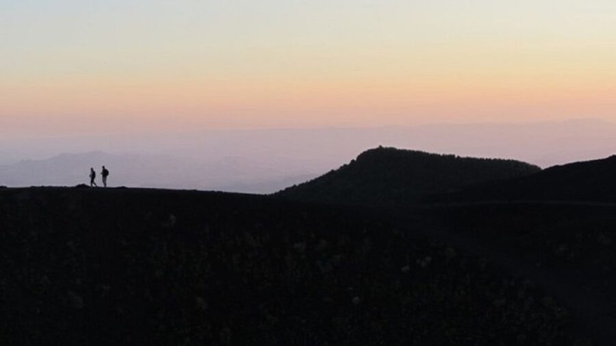 Taormina: Mount Etna Sunset Tour with Cave Visit and Tasting - Watching sunset from Etna’s upper slopes