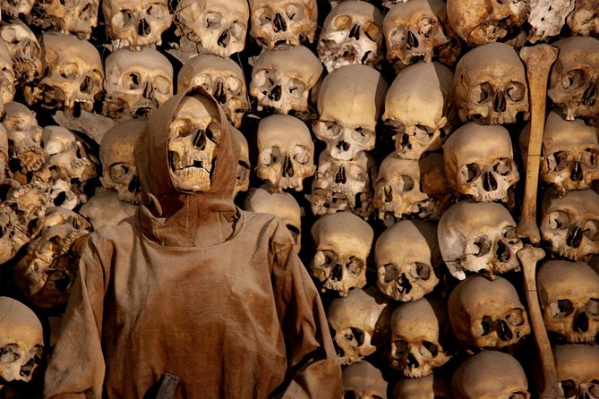 The Original Roman Crypts and Catacombs Tour with Transfers - Walking through the Domitilla Catacombs