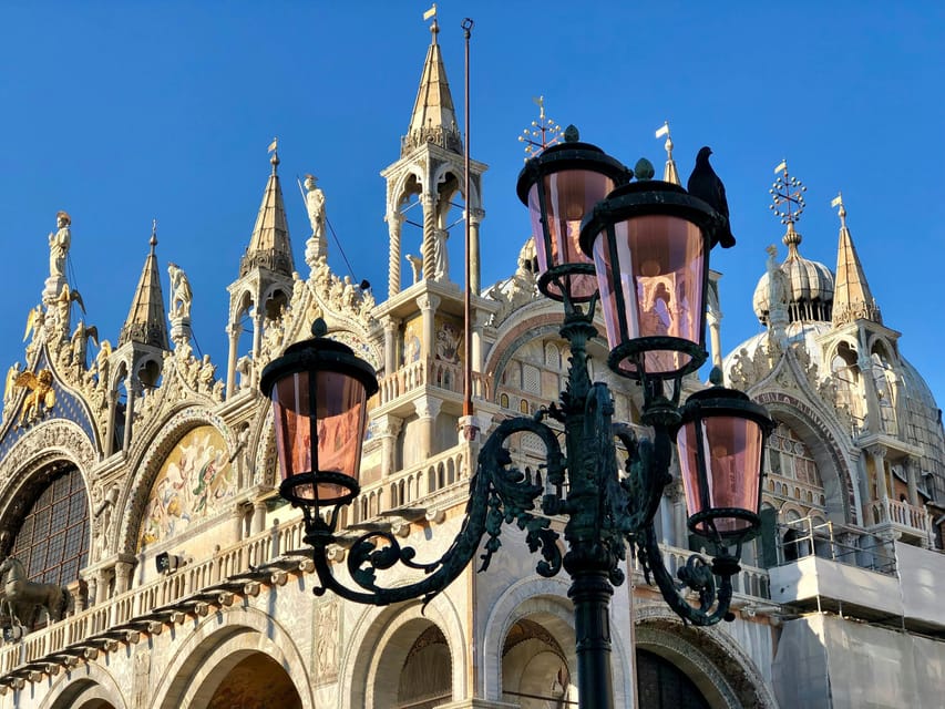 Venice: St. Mark's Basilica Ticket with Audio Guide - Meeting the host under the Clock Tower