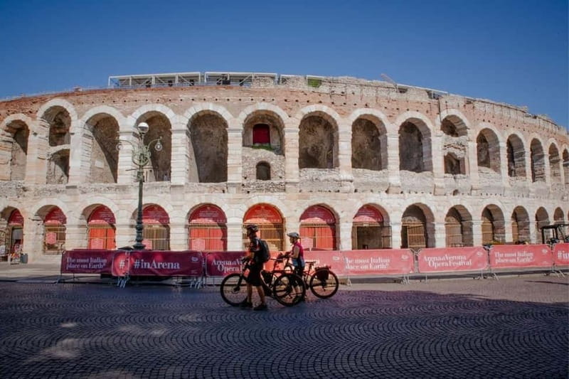 Verona: Classic and Hidden Gems Bike Tour - Riding through Verona’s central streets
