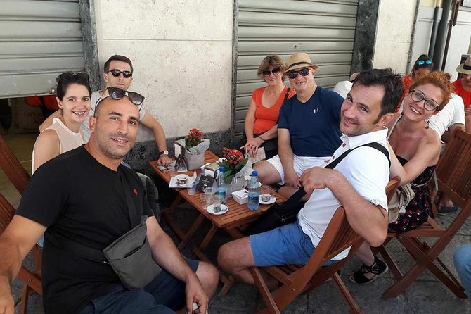 Walking Tour and street food Tour Palermo / History and Food - Meeting Domenico at Quattro Canti